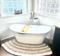 Chunky knit bath rug for freestanding tub